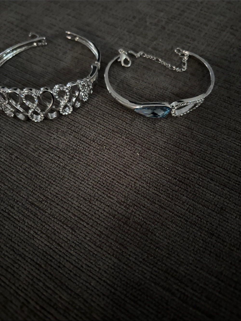 Two silver bracelets. Both fit a small wrist